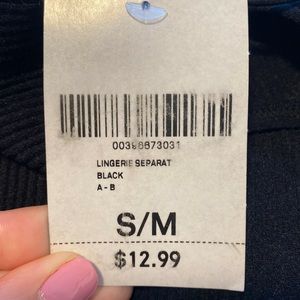 Black, ribbed, spaghetti strap bodysuit with open back. New with tags!!!